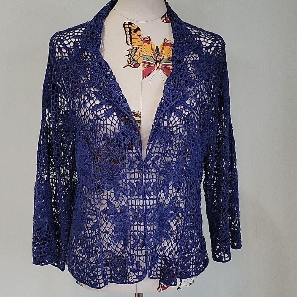 Blue crochet jacket with hook and eye closure.  No tags.